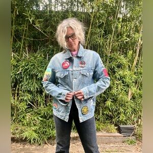 1990’s vintage Levi denim jacket full of patches mens or women’s size M/L